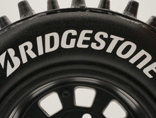 Load image into Gallery viewer, Best rc car tire / wheel sticker decals on the market. Made to fit BRP tires. Includes (8) stickers: "Bridgestone" Logo. Does not include BRP tall super spike tire. This vinyl is long-lasting, specially made for vehicles, and has permanent adhesive properties. Clear transfer tape is on top of the vinyl, to allow seamless transfer to your tires.  Refer to these dimensions to determine fitment: Stickers are 7/16 inch tall, and curved for a 4-1/4 inch diameter rim.