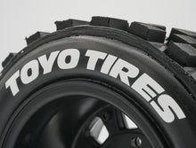 Load image into Gallery viewer, Best rc car tire / wheel sticker decals on the market. Made to fit BRP tires. Includes (8) stickers: "Toyo Tires" Logo. Does not include BRP knobby tire. This vinyl is long-lasting, specially made for vehicles, and has permanent adhesive properties. Clear transfer tape is on top of the vinyl, to allow seamless transfer to your tires.  Refer to these dimensions to determine fitment: Stickers are 3/8 inch tall, and curved for a 4-1/4 inch diameter rim.