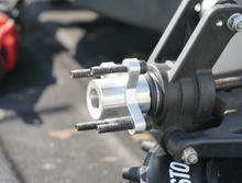 Load image into Gallery viewer, One of the lightest BRP Wheel Hub Adapters on the market. 62g each! Fits LOSI 5T, MCD, and Rovan LT. Anywhere between 13% - 28% lighter than most competitors. Made from 6061 aluminum.  Includes:  (2) BRP Wheel Hub Adapters (LOSI 5T, MCD, or Rovan LT) (2) O-rings (4) Socket head bolts (4) Nuts