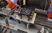 Load image into Gallery viewer, Fits LOSI 5T 3.0
Mounting the ESC above the center diff allows shorter motor leads. Integrated heat sink fins help maximize heat dissipation and cooling performance to keep electronics running cooler under demanding conditions.
Made from 6061 aluminum.
Includes:
(1) LOSI 5T 3.0 ESC Mount Upgrade with Heat Sink Fins
(4) Bolts