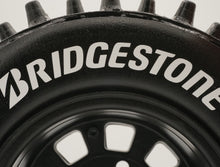 Load image into Gallery viewer, Best rc car tire / wheel sticker decals on the market. Made to fit BRP tires. Includes (8) stickers: &quot;Bridgestone&quot; Logo. Does not include BRP tall super spike tire. This vinyl is long-lasting, specially made for vehicles, and has permanent adhesive properties. Clear transfer tape is on top of the vinyl, to allow seamless transfer to your tires.  Refer to these dimensions to determine fitment: Stickers are 7/16 inch tall, and curved for a 4-1/4 inch diameter rim.
