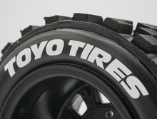 Load image into Gallery viewer, Best rc car tire / wheel sticker decals on the market. Made to fit BRP tires. Includes (8) stickers: &quot;Toyo Tires&quot; Logo. Does not include BRP knobby tire. This vinyl is long-lasting, specially made for vehicles, and has permanent adhesive properties. Clear transfer tape is on top of the vinyl, to allow seamless transfer to your tires.  Refer to these dimensions to determine fitment: Stickers are 3/8 inch tall, and curved for a 4-1/4 inch diameter rim.
