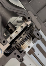 Load image into Gallery viewer, Replace the stock plastic carrier with a precision-machined billet aluminum upgrade. Designed for increased durability and improved resistance to heat-related wear and deformation, helping maintain bearing alignment under demanding conditions.
