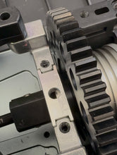 Load image into Gallery viewer, Replace the stock plastic carrier with a precision-machined billet aluminum upgrade. Designed for increased durability and improved resistance to heat-related wear and deformation, helping maintain bearing alignment under demanding conditions.
